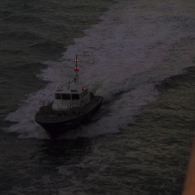 Under way -- Harbor master departs — 033