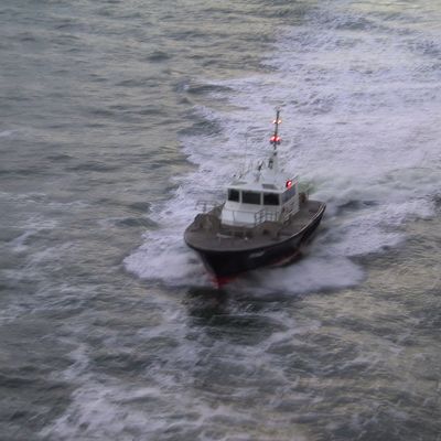 Under way -- Harbor master departs — 034