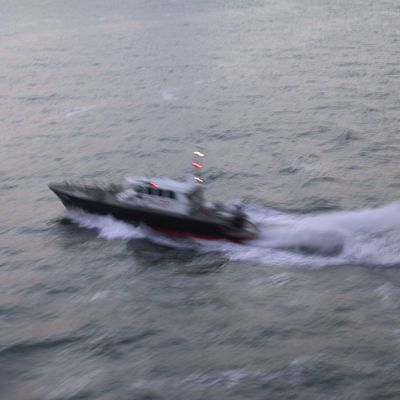 Under way -- Harbor master departs — 035